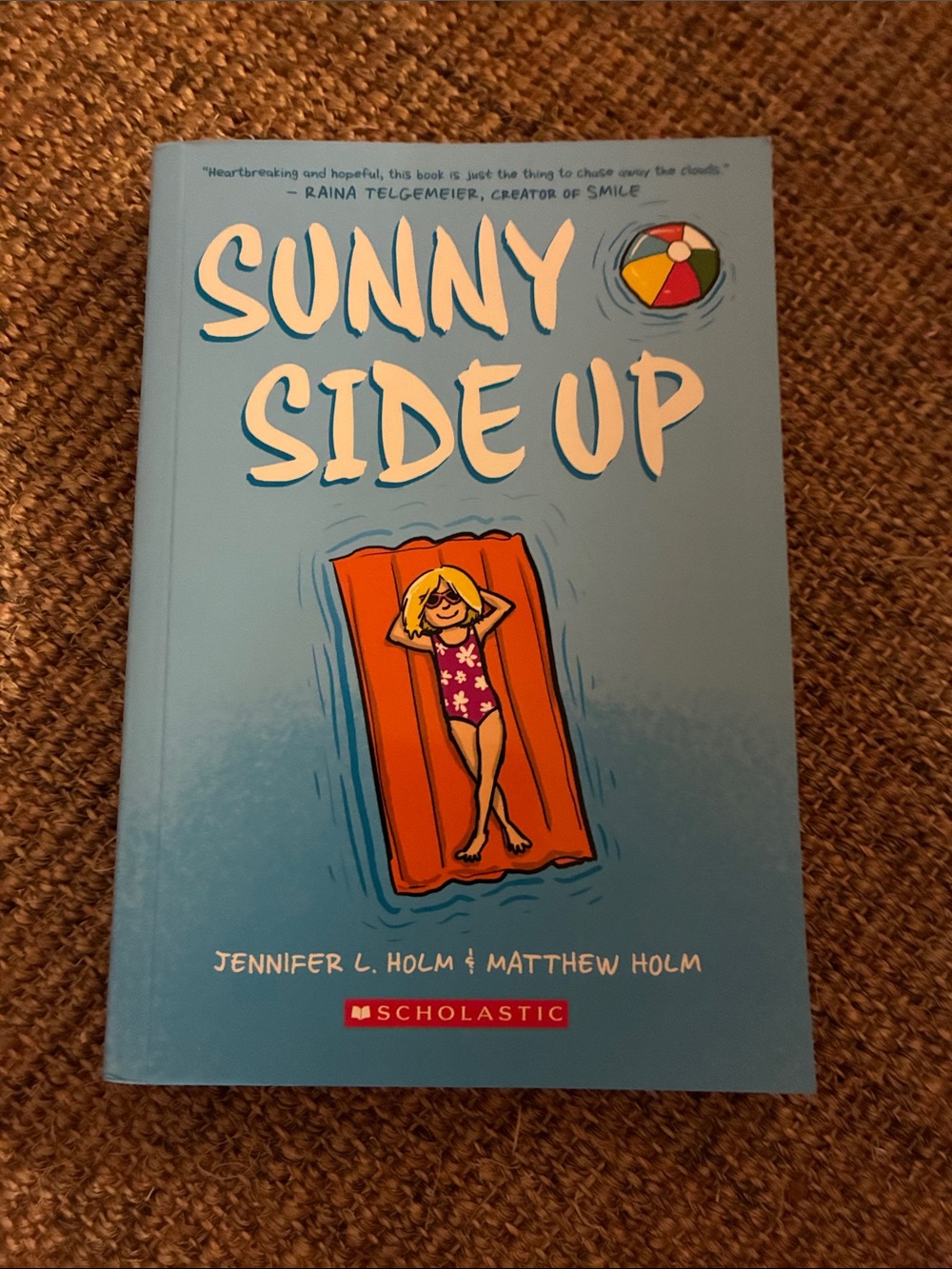 Scholastic Sunny Side Up — Blue Cover with Orange Float
